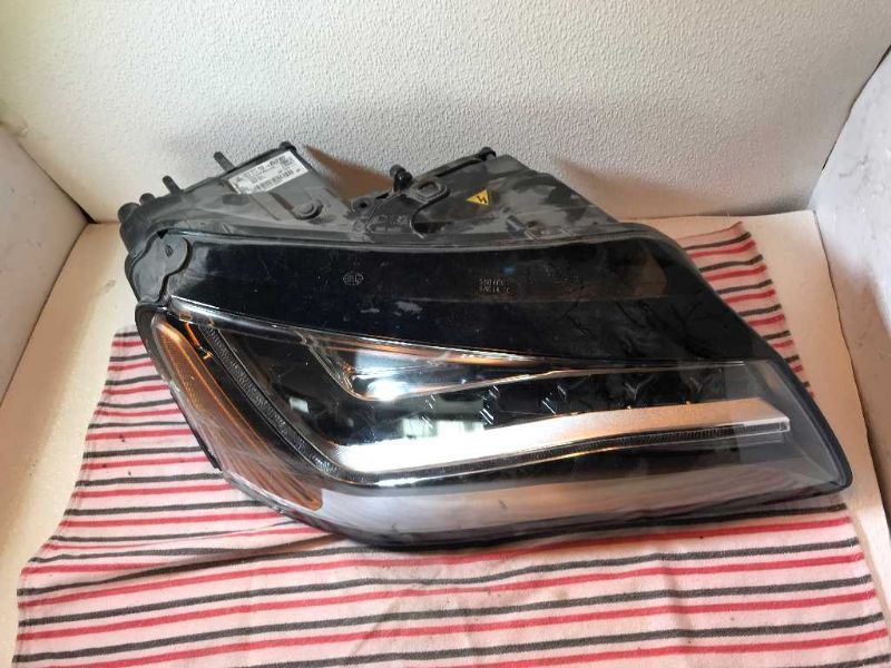 Headlamp Assembly used genuine OEM Audi A8 Quattro 2011-2014