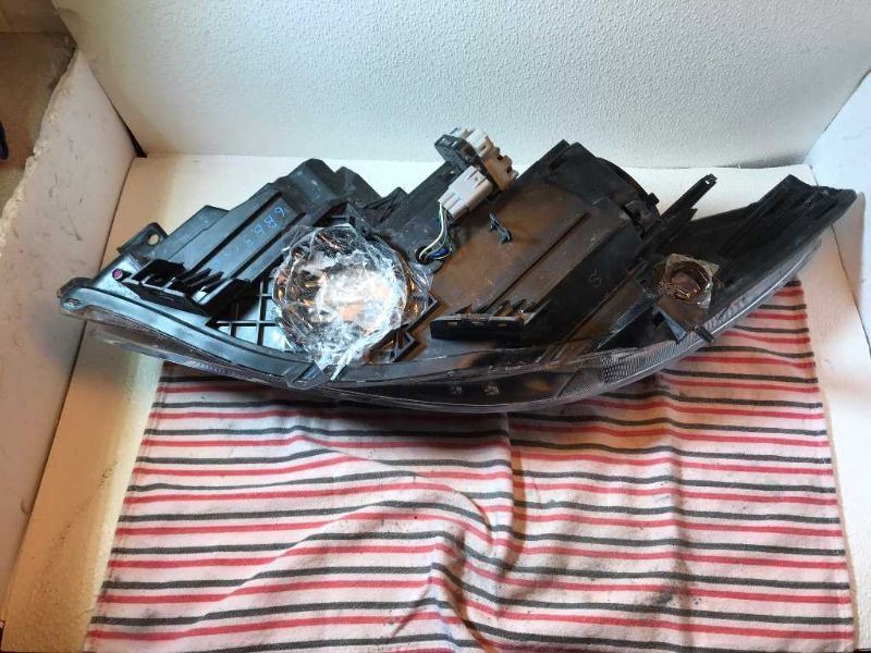 Right headlamp lens/housing used genuine OEM Mazda 3 2010-2011