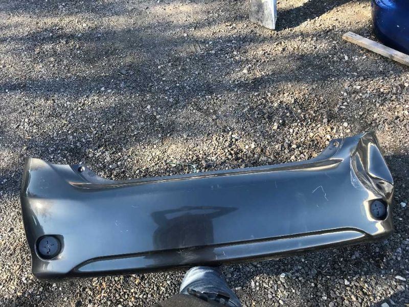 Rear bumper cover used genuine OEM Toyota Corolla 2009-2010