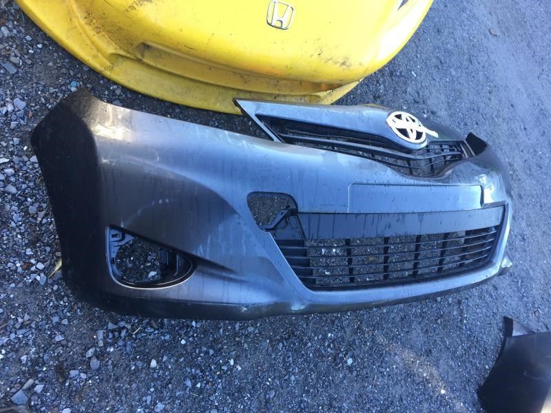 Front bumper grille used genuine OEM Toyota Yaris 2012-2014