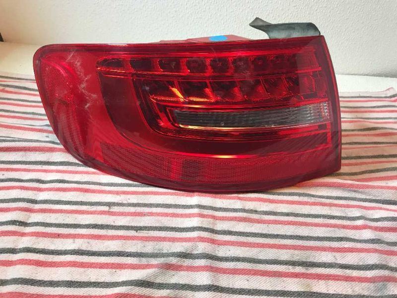Left taillamp assembly outer used genuine OEM Audi A4 2009-2016