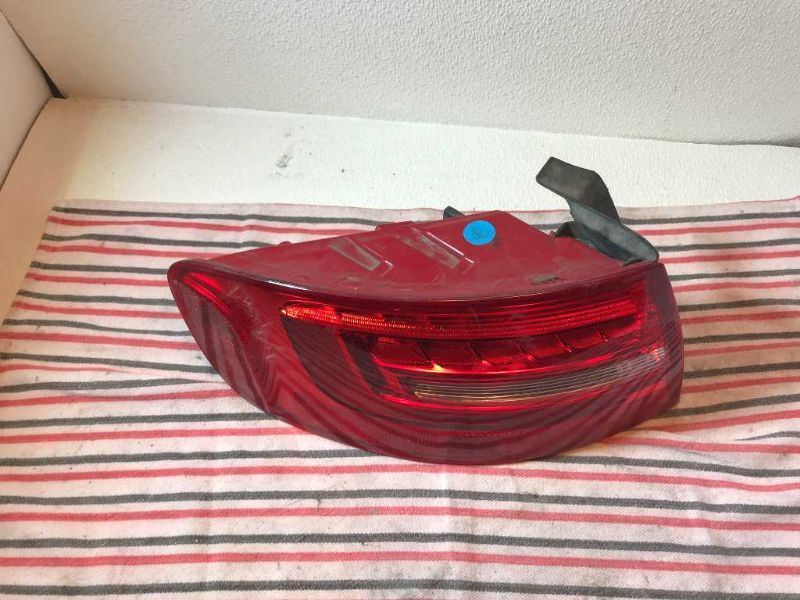 Left taillamp assembly outer used genuine OEM Audi A4 2009-2016