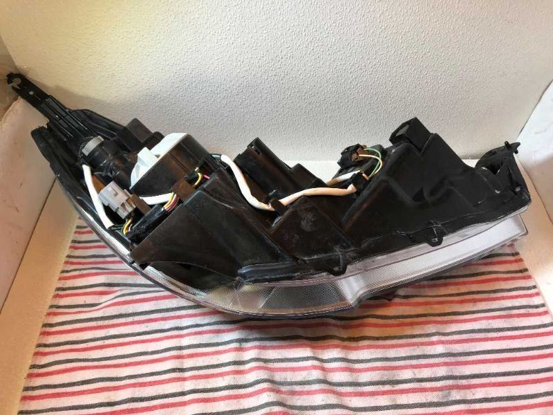 Faro izquierdo usado original (OEM) Subaru Legacy 2010-2012