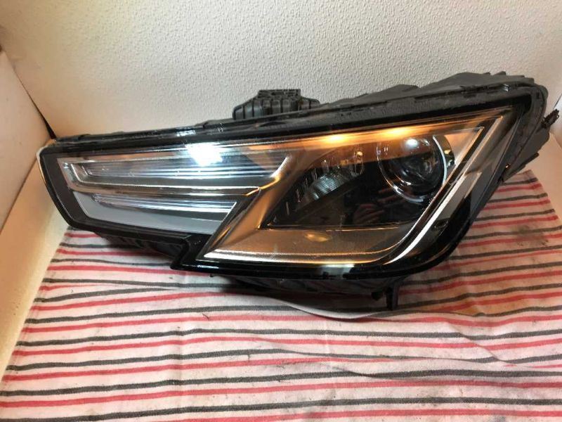 Left headlamp assembly composite used genuine OEM Audi A4 2017-2019