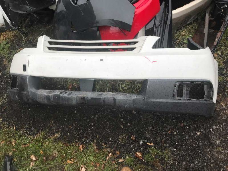 Front bumper cover used genuine OEM Subaru Outback 2010-2012