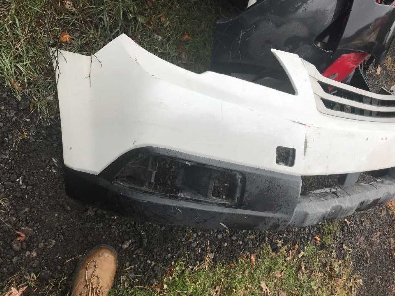 Front bumper cover used genuine OEM Subaru Outback 2010-2012