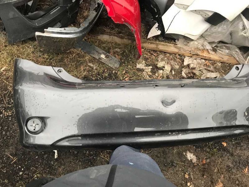 Rear bumper cover used genuine OEM Toyota Corolla 2009-2010