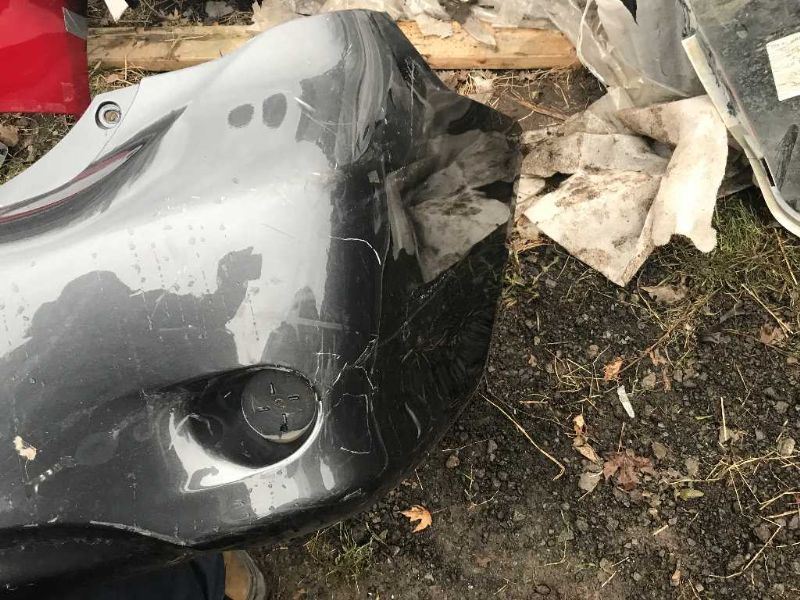 Rear bumper cover used genuine OEM Toyota Corolla 2009-2010