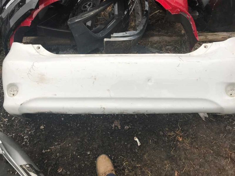 Rear bumper cover used genuine OEM Toyota Corolla 2009-2010