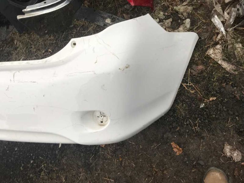 Rear bumper cover used genuine OEM Toyota Corolla 2009-2010