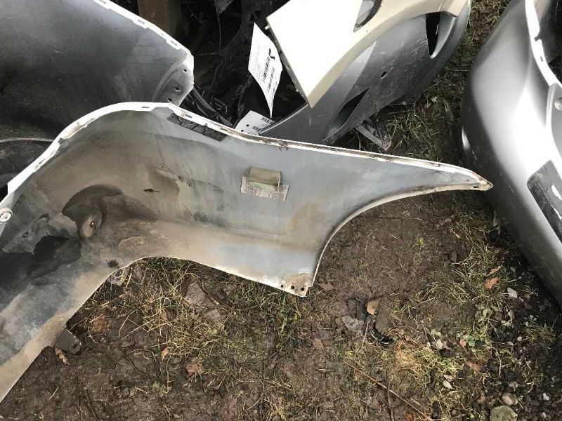Rear bumper cover used genuine OEM Toyota Corolla 2009-2010