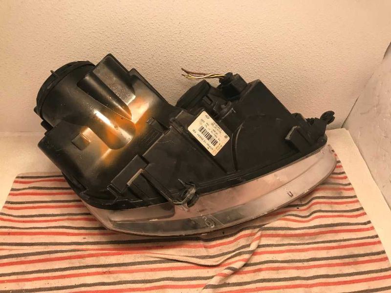 Left headlamp assembly composite used genuine OEM Volkswagen Jetta 2005-2010