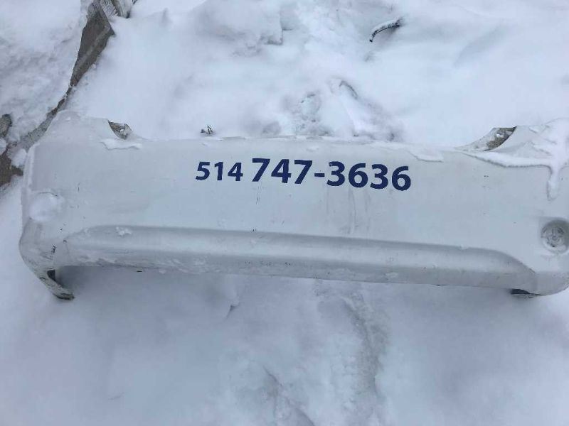 Rear bumper cover used genuine OEM Toyota Corolla 2009-2010