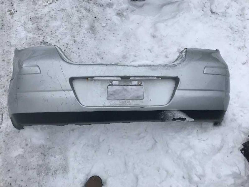 Rear bumper cover used genuine OEM Nissan Versa 2007-2012