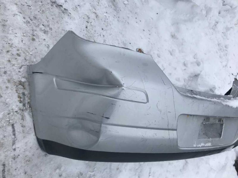 Rear bumper cover used genuine OEM Nissan Versa 2007-2012