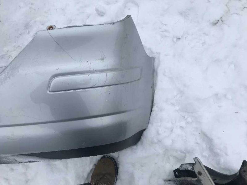 Rear bumper cover used genuine OEM Nissan Versa 2007-2012