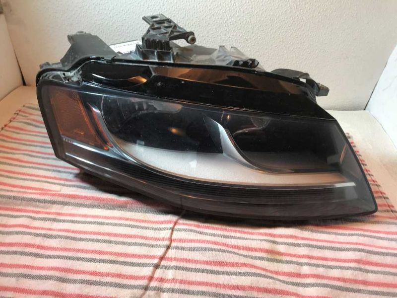 Headlamp Assembly used genuine OEM Audi A4 2012-2016