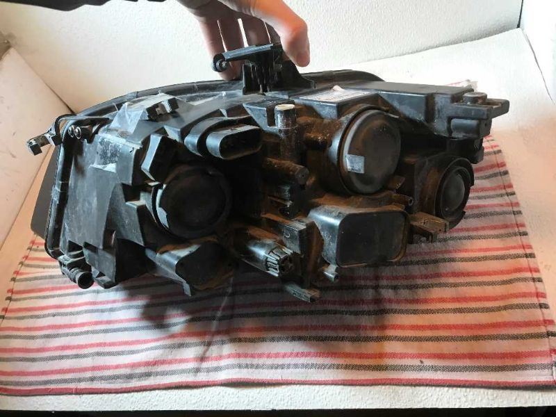 Headlamp Assembly used genuine OEM Audi A4 2012-2016