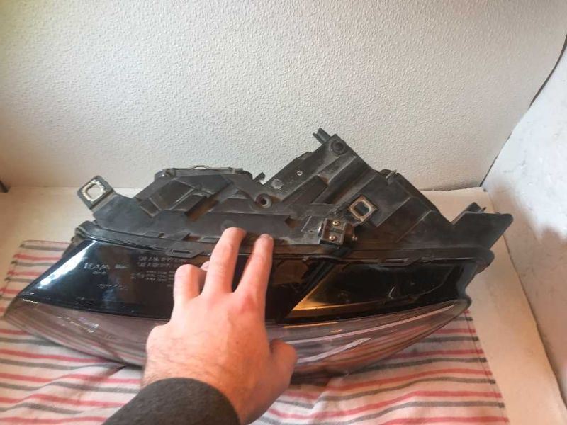 Left headlamp bracket used genuine OEM Audi Q5 2009-2012
