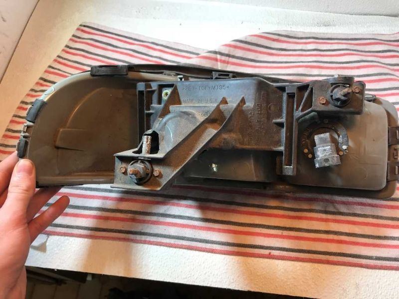 Faro izquierdo usado original (OEM) GMC Sierra 1500 1999-2006