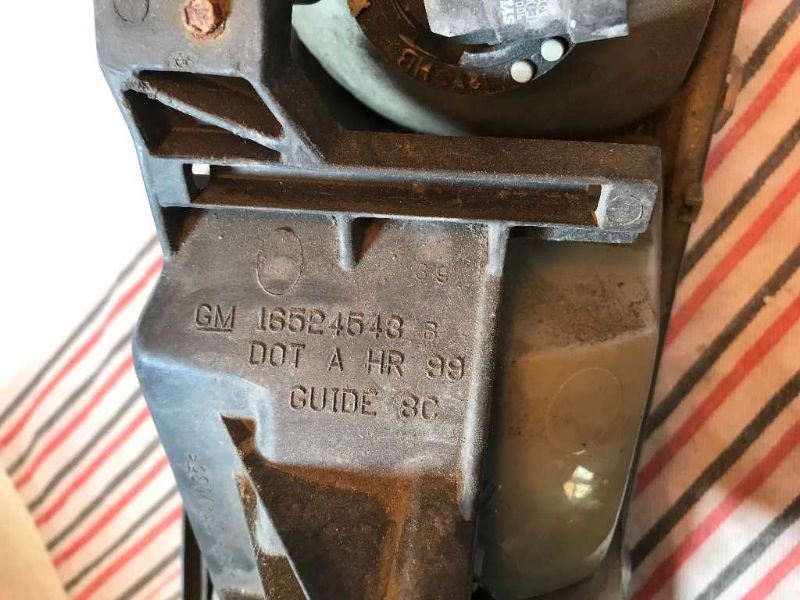 Faro izquierdo usado original (OEM) GMC Sierra 1500 1999-2006
