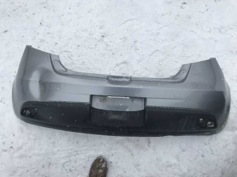 Defensa (parachoques) trasera usada original (OEM) Mazda 2 2011-2014