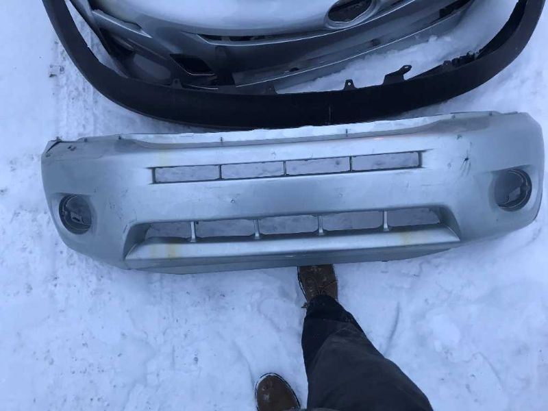 Front bumper cover used genuine OEM Toyota RAV4 2004-2005