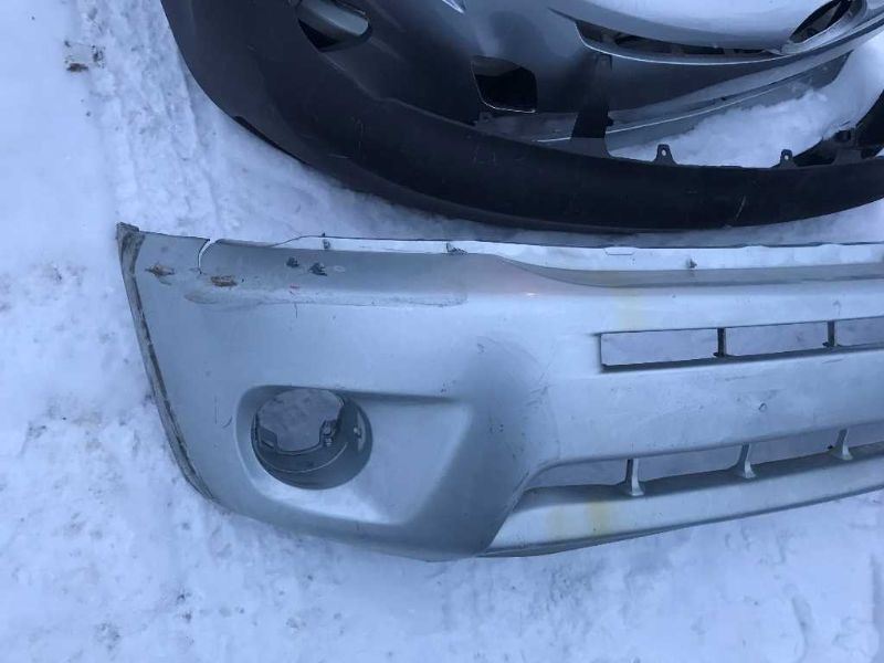 Front bumper cover used genuine OEM Toyota RAV4 2004-2005