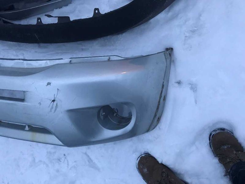Front bumper cover used genuine OEM Toyota RAV4 2004-2005