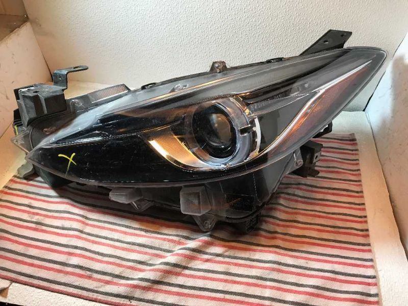 Headlamp Assembly used genuine OEM Mazda 3 2014-2018