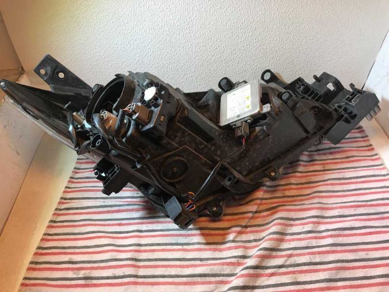 Headlamp Assembly used genuine OEM Mazda 3 2014-2018