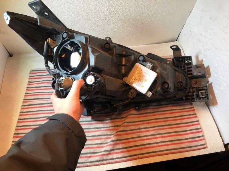 Headlamp Assembly used genuine OEM Mazda 3 2014-2018