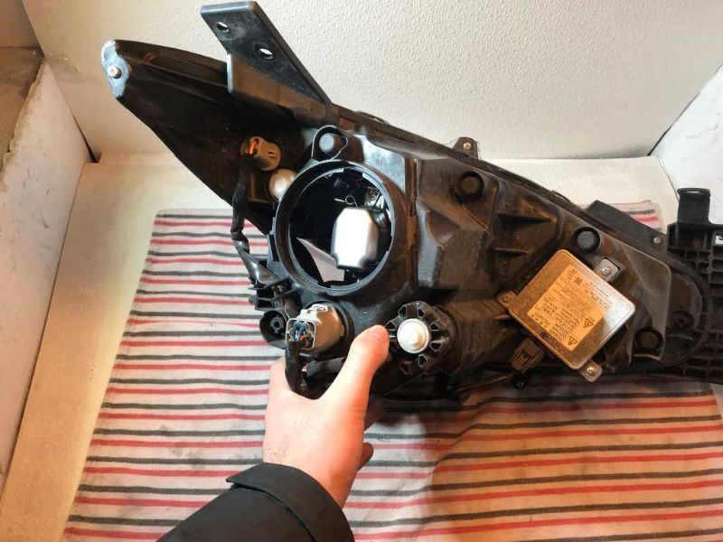 Headlamp Assembly used genuine OEM Mazda 3 2014-2018