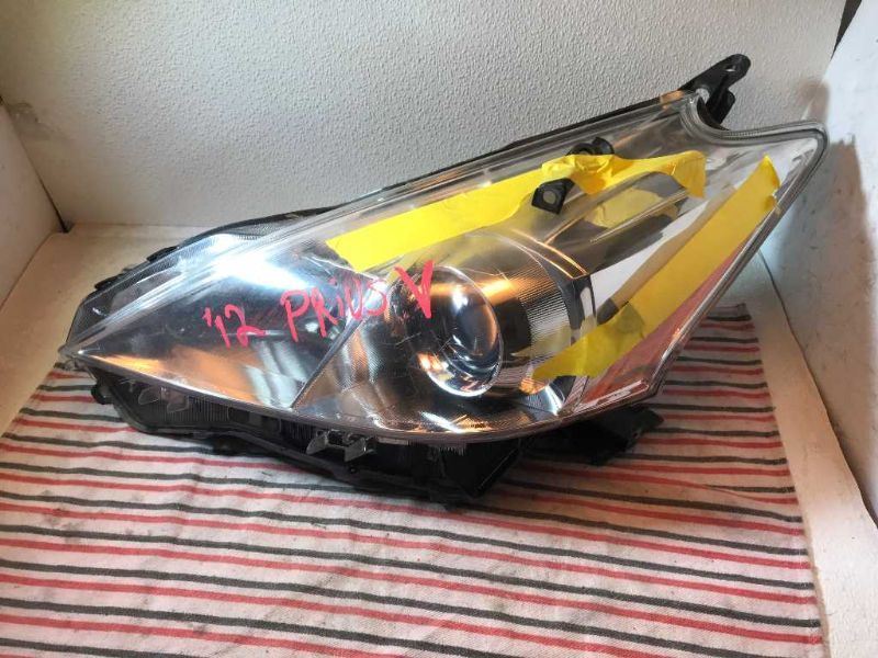 Left headlamp lens/housing used genuine OEM Toyota Prius 2012-2015