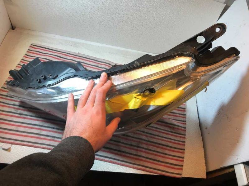 Left headlamp lens/housing used genuine OEM Toyota Prius 2012-2015