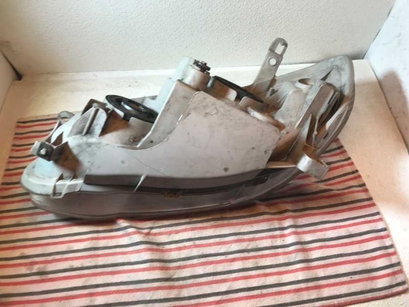 Right headlamp assembly composite used genuine OEM Toyota Corolla 2003-2004