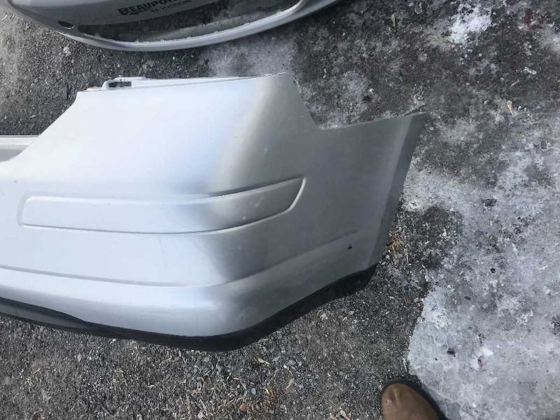 Rear bumper cover used genuine OEM Nissan Versa 2007-2012