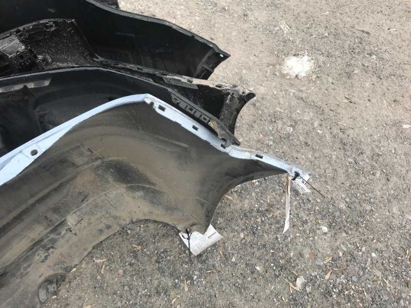 Defensa (parachoques) trasera usada original (OEM) Nissan Versa 2007-2012