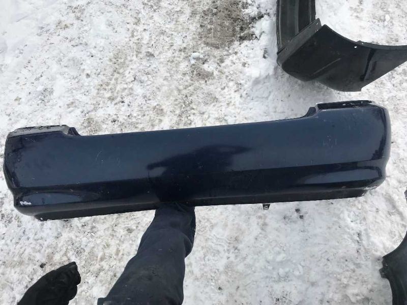 Rear bumper cover used genuine OEM Toyota Corolla 2003-2008