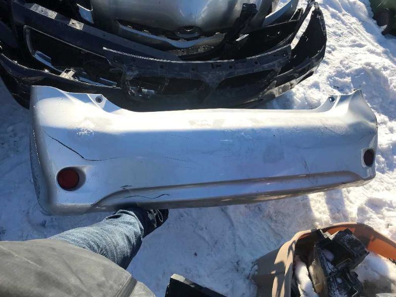 Rear bumper cover used genuine OEM Toyota Corolla 2009-2010