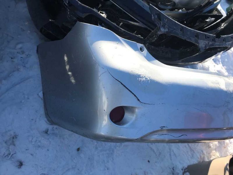Rear bumper cover used genuine OEM Toyota Corolla 2009-2010