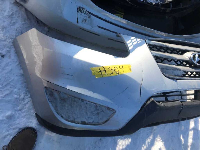 Front bumper cover used genuine OEM Hyundai Santa FE 2010-2012