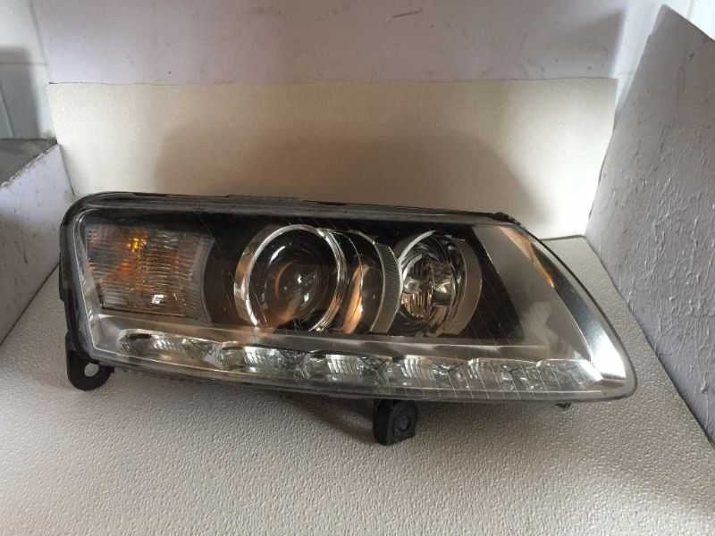 Headlamp Assembly used genuine OEM Audi A6 2005-2010