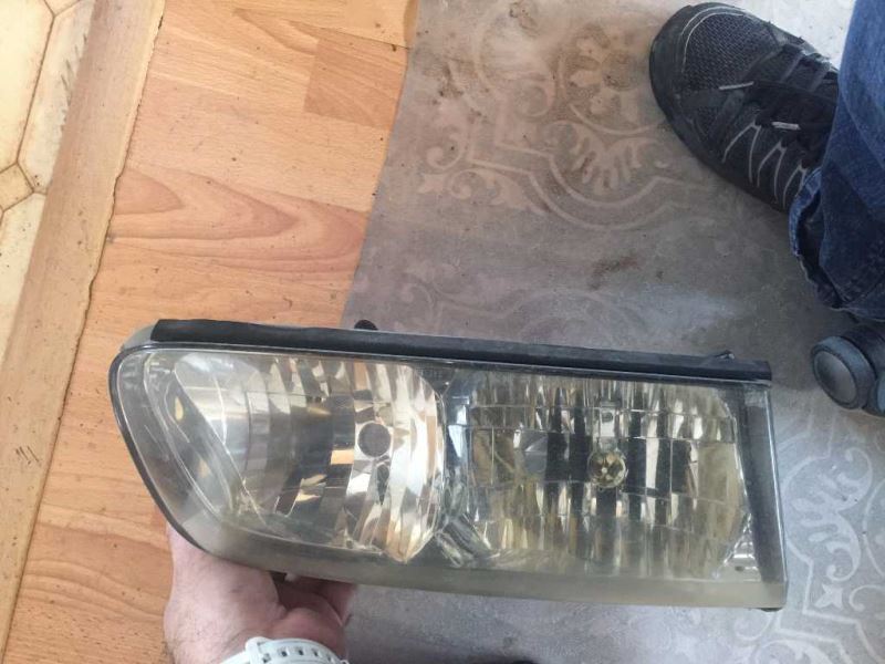 Right headlamp assembly composite used genuine OEM Toyota Corolla 1993-1997