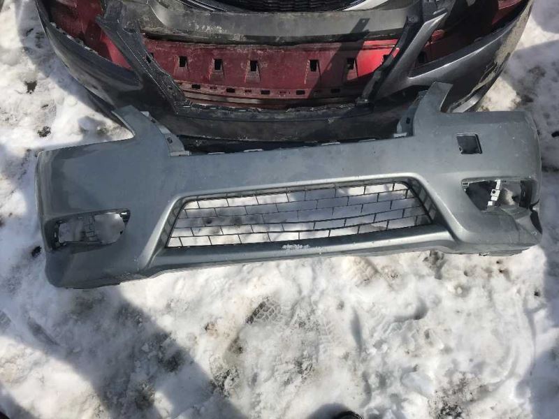 Front bumper cover used genuine OEM Nissan Sentra 2013-2015