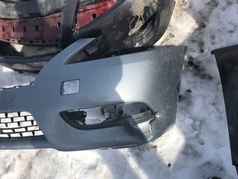 Front bumper cover used genuine OEM Nissan Sentra 2013-2015