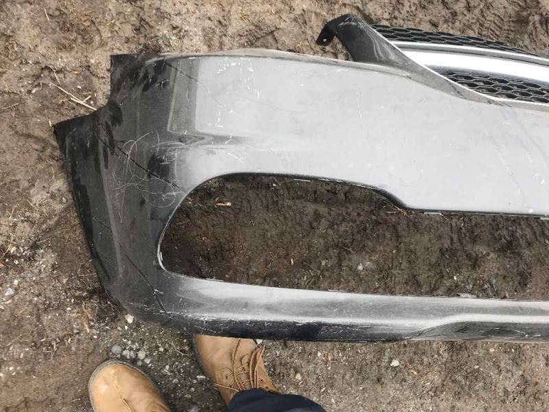 Front bumper cover used genuine OEM Dodge Grand Caravan 2011-2020