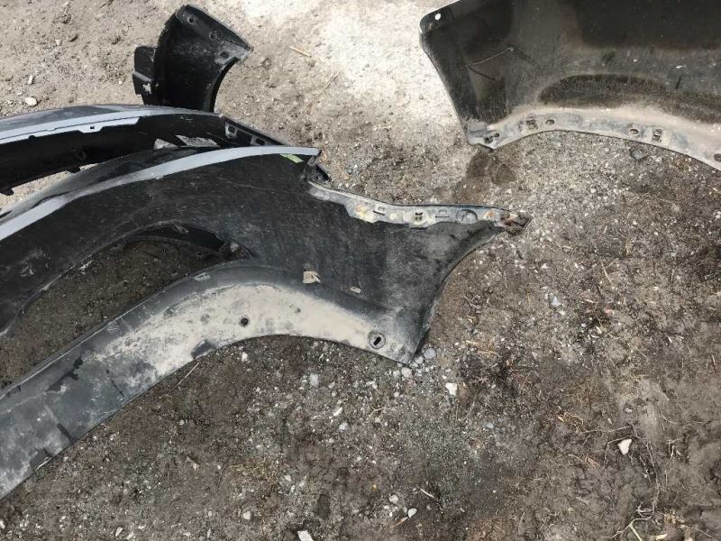 Front bumper cover used genuine OEM Dodge Grand Caravan 2011-2020