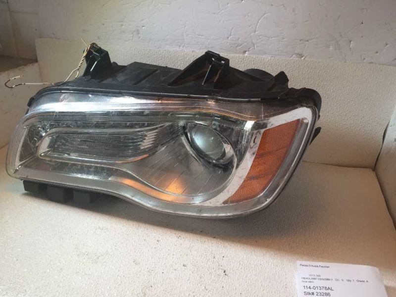 Headlamp Assembly used genuine OEM Chrysler 300 2011-2014
