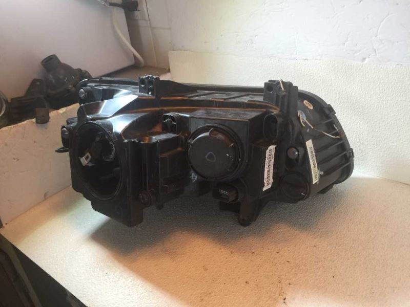 Headlamp Assembly used genuine OEM Chrysler 300 2011-2014